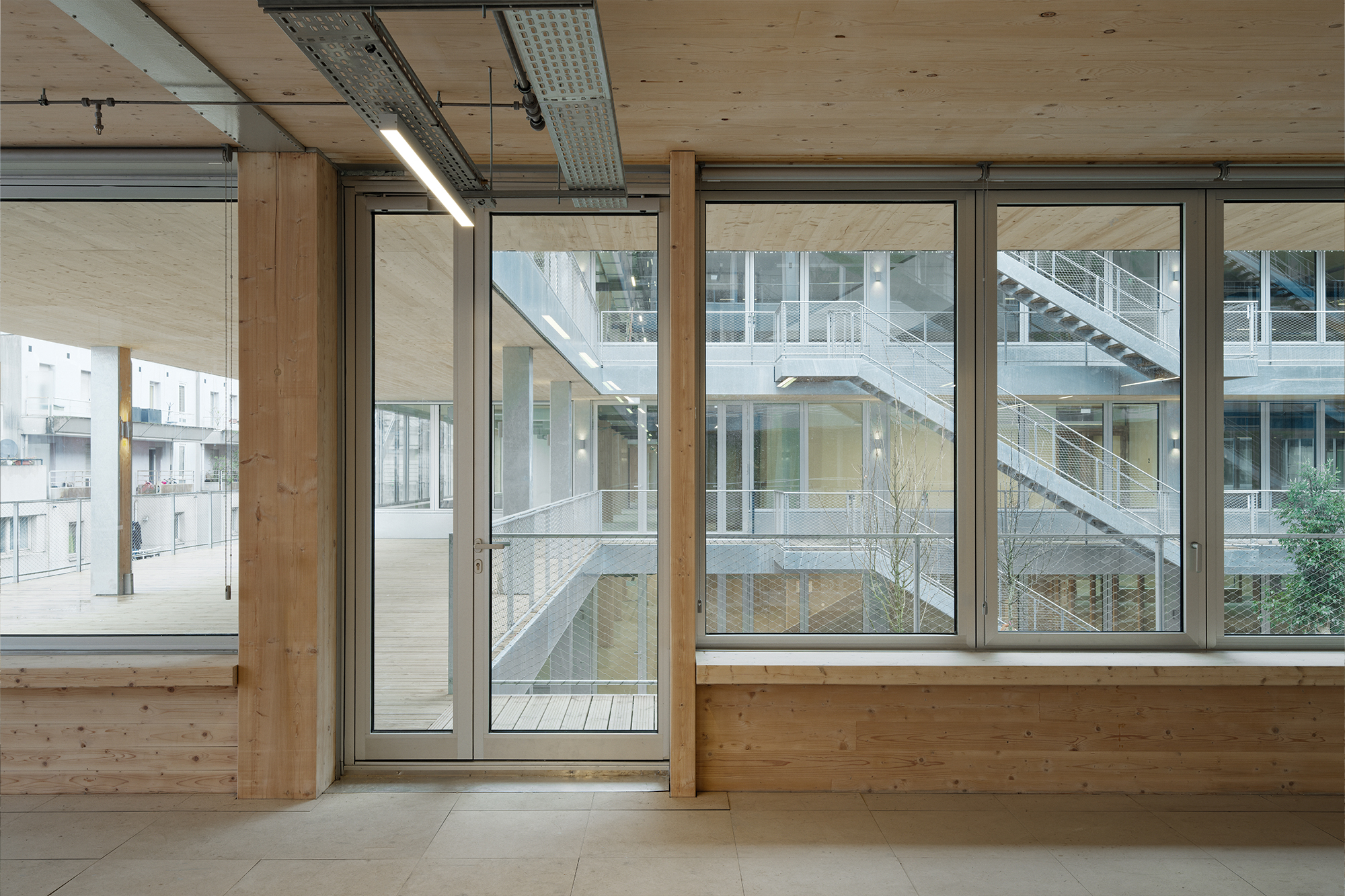 Ensemble mixte avec surélévation en bois, rue des Poissonniers projet-mixte-bois-poissonniers-46